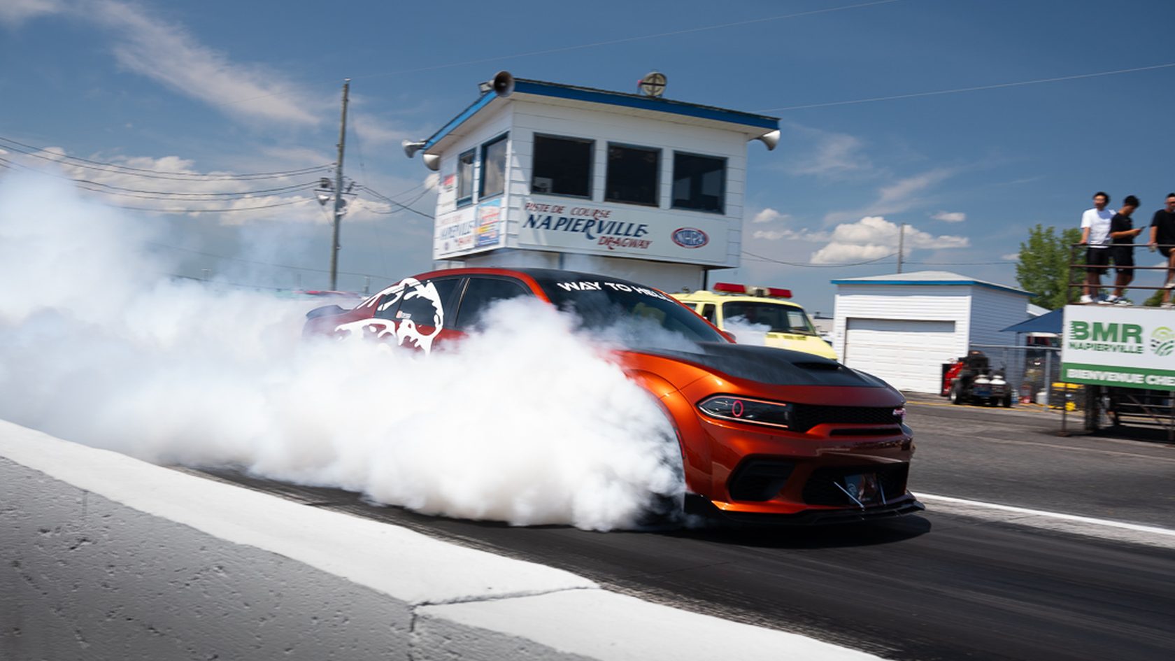 A Dodge Charger doing a burnout