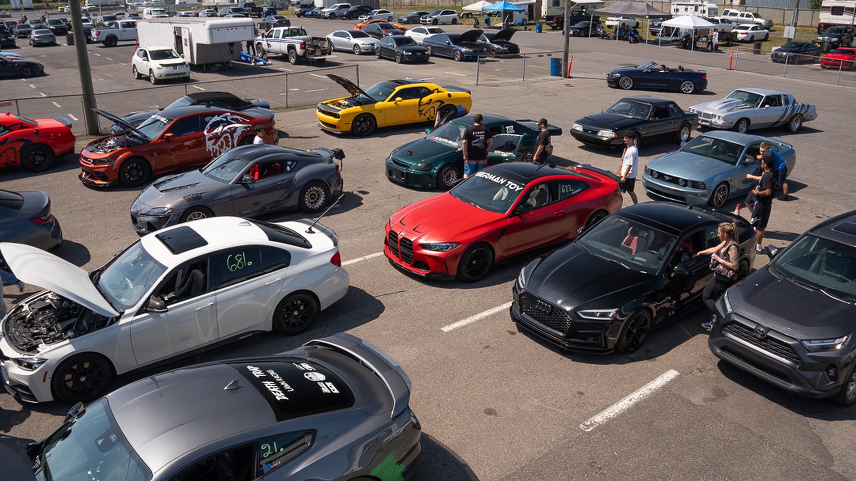 The full MVISION paddock packed with cars